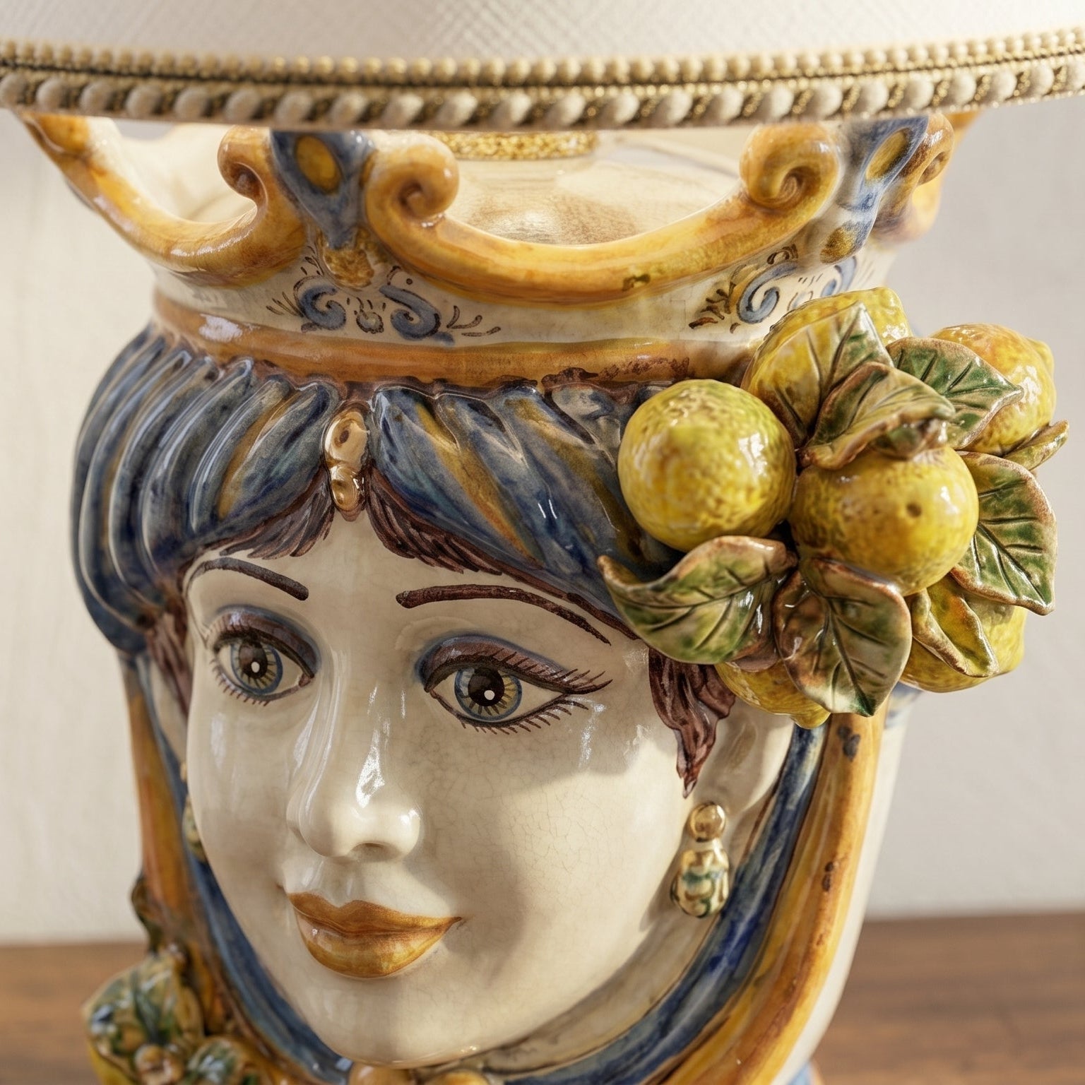 Handmade ceramic Teste di Moro lamp with colorful fruit and leaf details, blending tradition and modern design.