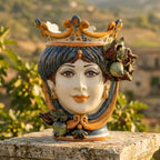 Handcrafted Teste di Moro ceramic vase with crown, figs, and blue hair, blending tradition and modern design.
