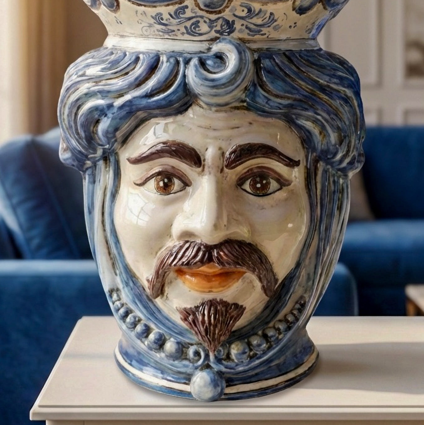 Handcrafted ceramic Testa di Moro with blue swirls, mustache, and crown, perfect Sicilian home decor
