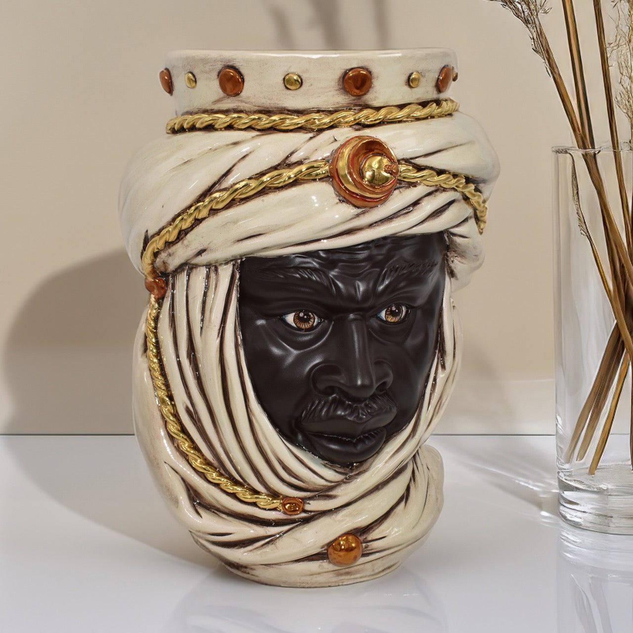 Handcrafted Teste di Moro ceramic vase with detailed turban and gold accents, blending tradition and modern design.