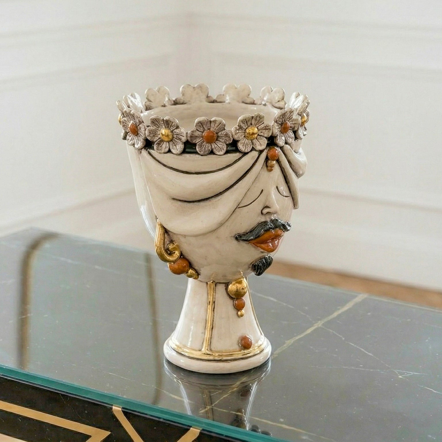 Handcrafted Teste di Moro ceramic vase with floral crown, mustache, and gold accents, perfect for modern home decor.