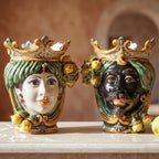Handcrafted Teste di Moro ceramic vases with crowned faces, vibrant colors, and lemon accents for home decor