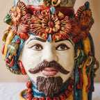 Handcrafted Teste di Moro ceramic vase with vibrant floral crown, beard, and traditional Sicilian design