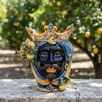 Handmade Sicilian Teste di Moro ceramic vase with crown, blue hair, and lemon accents, outdoor garden decor
