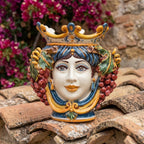 Handcrafted Teste di Moro ceramic vase with crown, grapes, and vibrant colors, perfect for Mediterranean decor