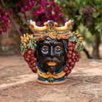 Handcrafted Teste di Moro ceramic vase with crown, grapes, and vibrant colors, perfect for home decor