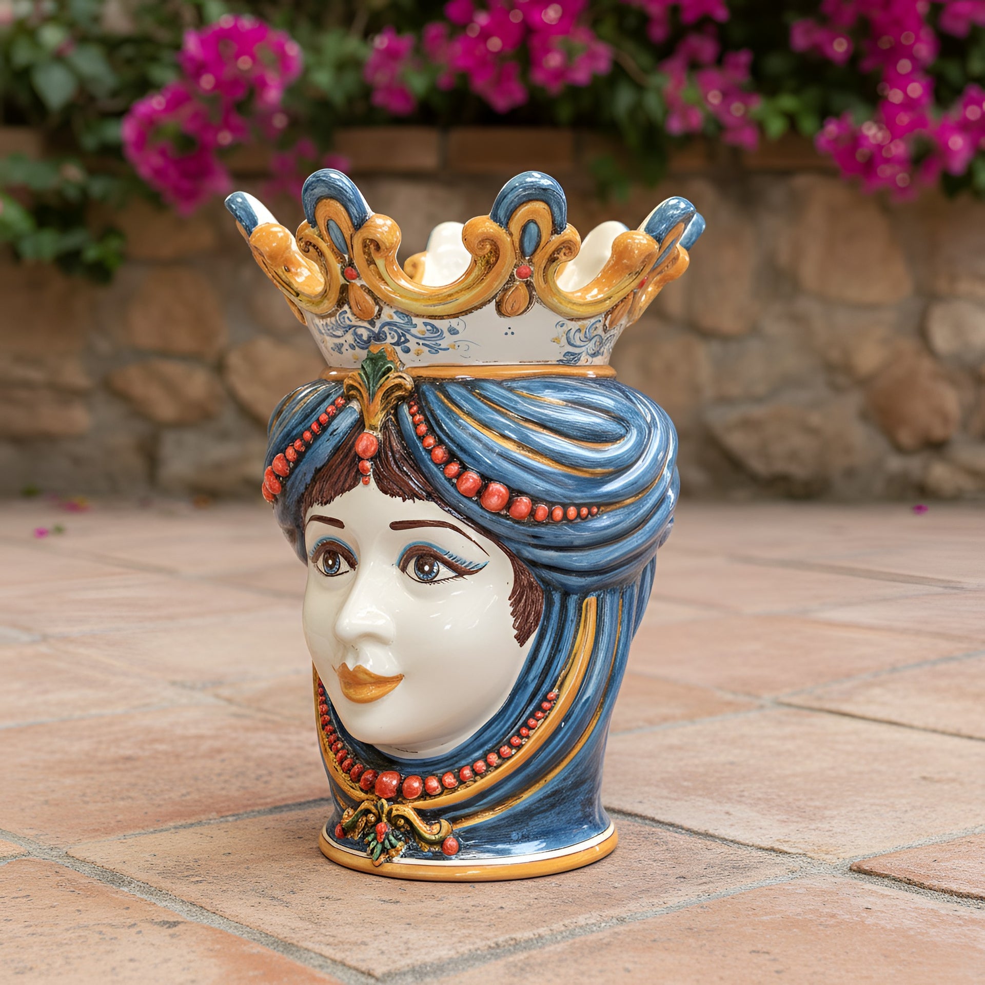 Handcrafted Teste di Moro ceramic vase with blue hair, crown, and coral beads, perfect for home decor