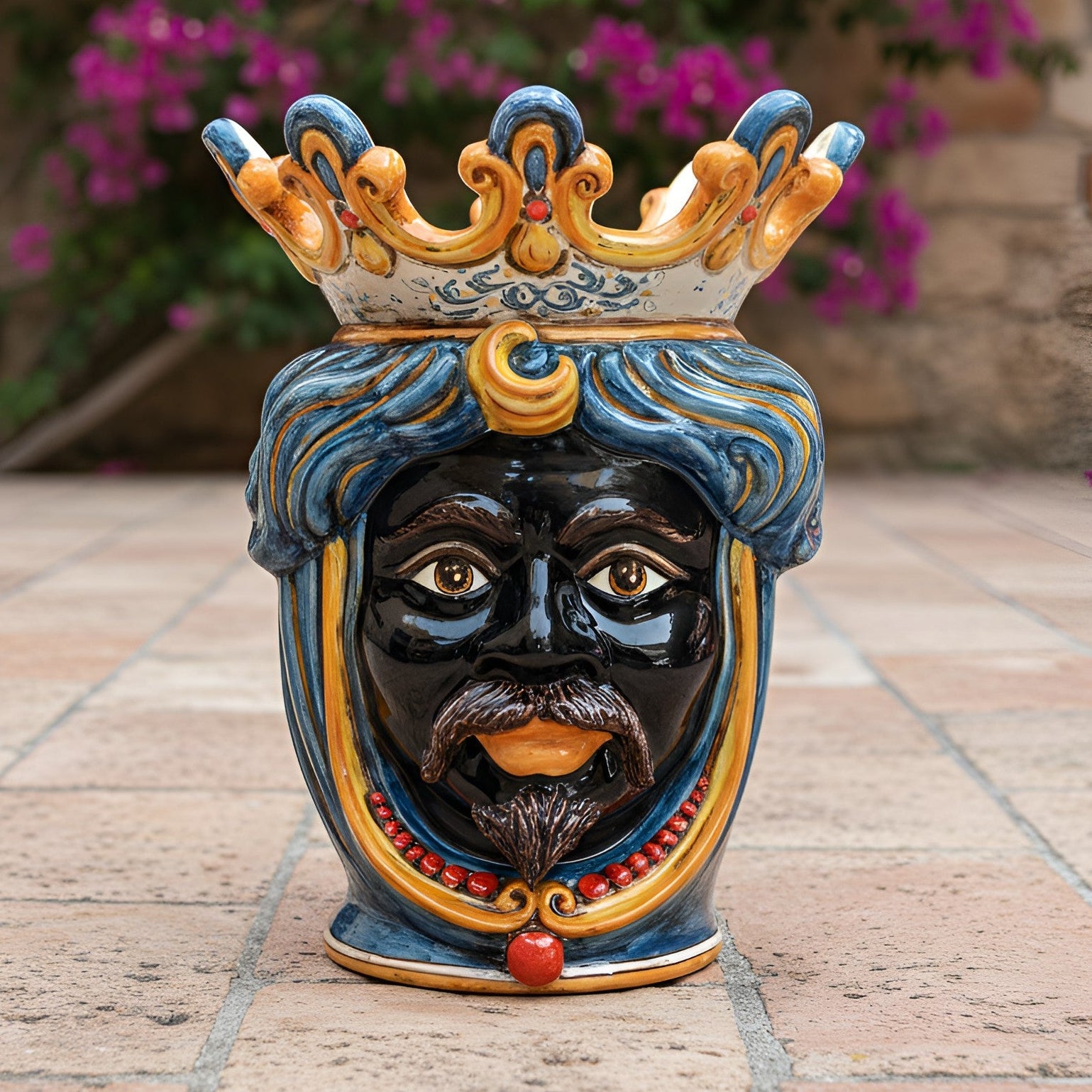 Handcrafted Teste di Moro ceramic vase with crown, blue hair, and vibrant colors for home decor
