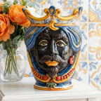 Handmade Teste di Moro ceramic vase with crown, blue turban, and vibrant colors, perfect for home decor.