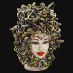 Handmade ceramic Medusa head sculpture with snake hair, vibrant colors, perfect for modern or traditional decor.