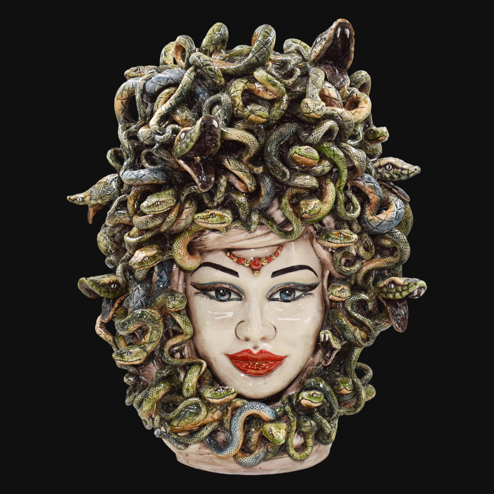 Handcrafted Medusa head sculpture with vibrant snakes, perfect for modern or traditional decor
