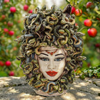 Handcrafted Medusa head sculpture with snake hair, vibrant colors, perfect for modern or traditional decor