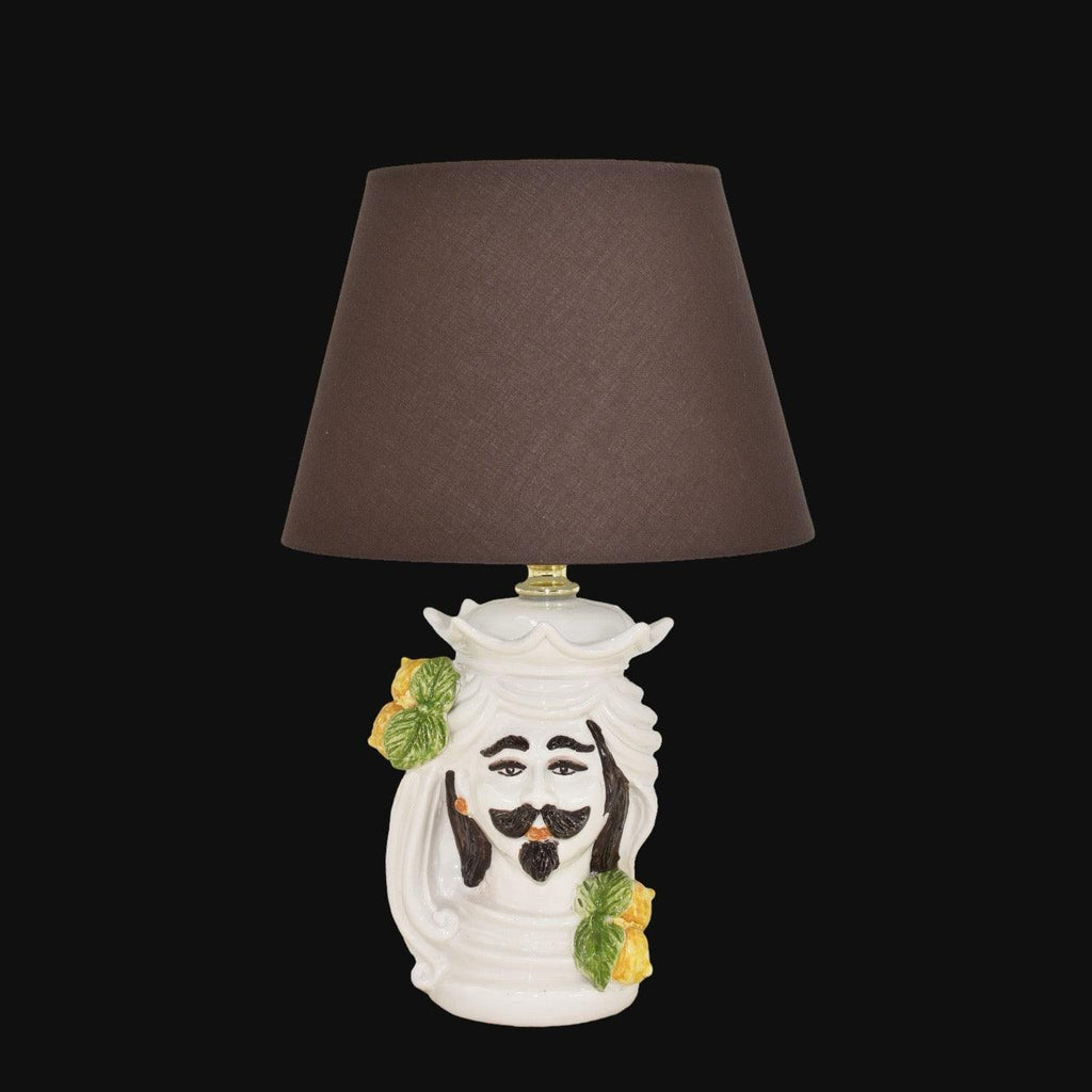 Handmade Teste di Moro table lamp with ceramic Moorish face, lemon accents, and brown shade — traditional Sicilian decor