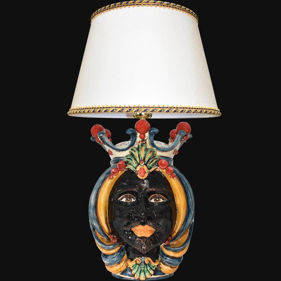 Handcrafted Teste di Moro table lamp with colorful ceramic face, crown, and white shade