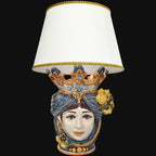 Handmade Teste di Moro table lamp with ceramic face, blue turban, and lemon accents under white shade