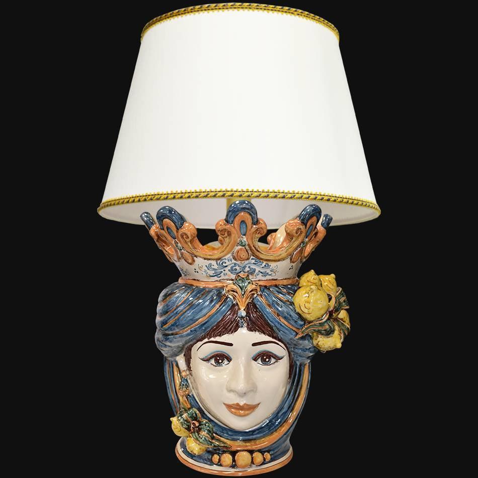 Handmade Teste di Moro table lamp with ceramic face, blue turban, and lemon accents under white shade