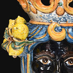 Handcrafted Teste di Moro ceramic with vibrant blue hair, yellow lemons, and ornate crown details