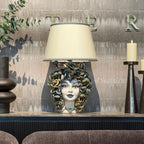 Handcrafted Medusa head table lamp with snake details, blending tradition and modern design for home decor.