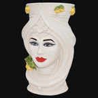 White ceramic Testa di Moro vase with lemon accents, handcrafted Sicilian decor featuring elegant facial details