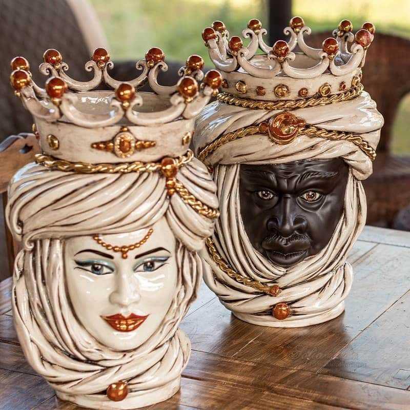 Handcrafted Teste di Moro ceramic heads with crowns, blending tradition and modern design for home decor.