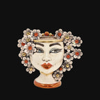 Handmade Teste di Moro vase with floral crown, blue eyes, and gold accents, blending tradition and modern design.