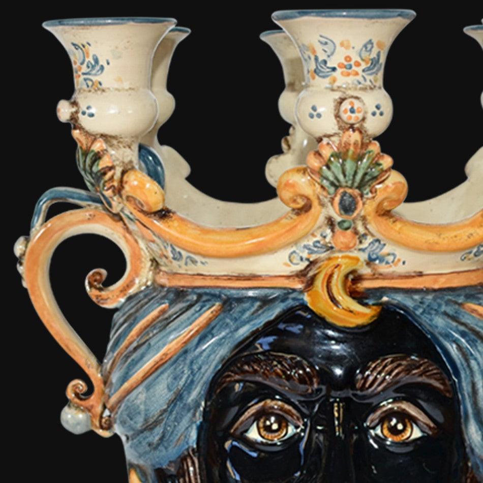 Handcrafted Teste di Moro ceramic candle holder with ornate blue and gold details, traditional Sicilian design