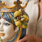 Handcrafted Teste di Moro ceramic vase with lemon motif, blending Sicilian tradition and modern design.