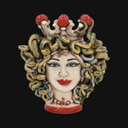 Handcrafted Teste di Moro ceramic with snake hair, red accents, and crown, blending tradition and modern design