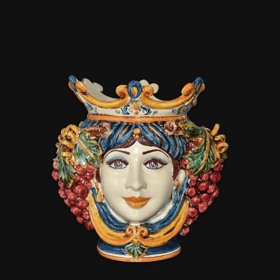 Handmade Sicilian Testa di Moro vase with crown, grapes, and vibrant colors, blending tradition and modern design.