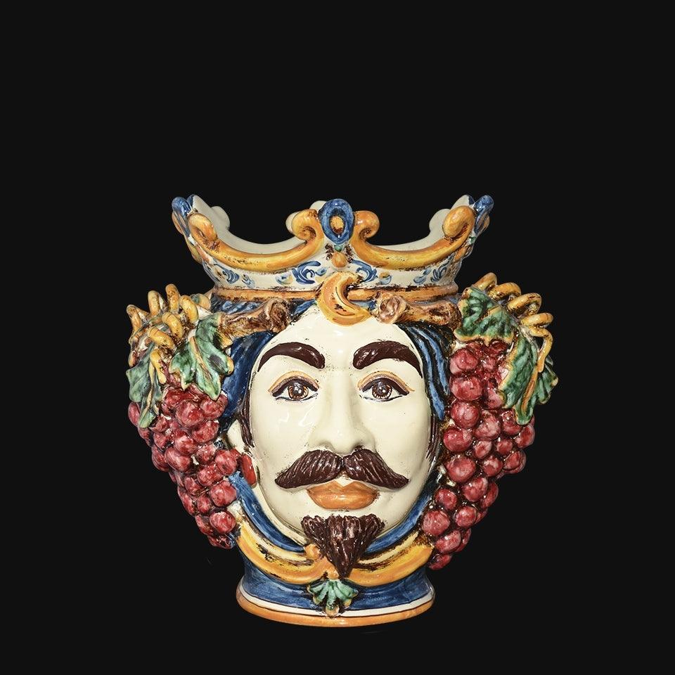 Handcrafted Teste di Moro vase with crown, grapes, and mustache, blending Sicilian tradition and modern design.