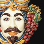 Handmade Teste di Moro ceramic vase with colorful grapes and ornate details, blending tradition and modern design.