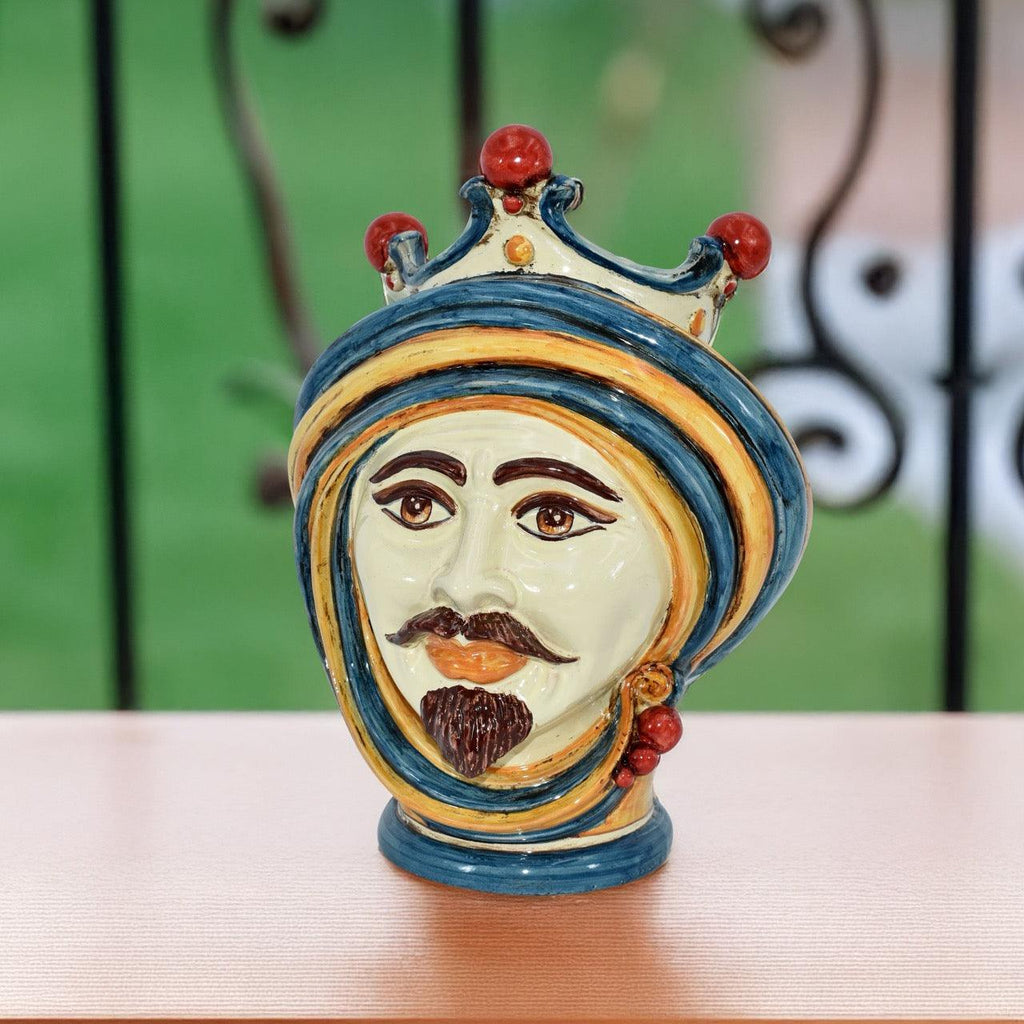 Handcrafted Teste di Moro ceramic head with crown, vibrant blue and gold turban, traditional Sicilian decor