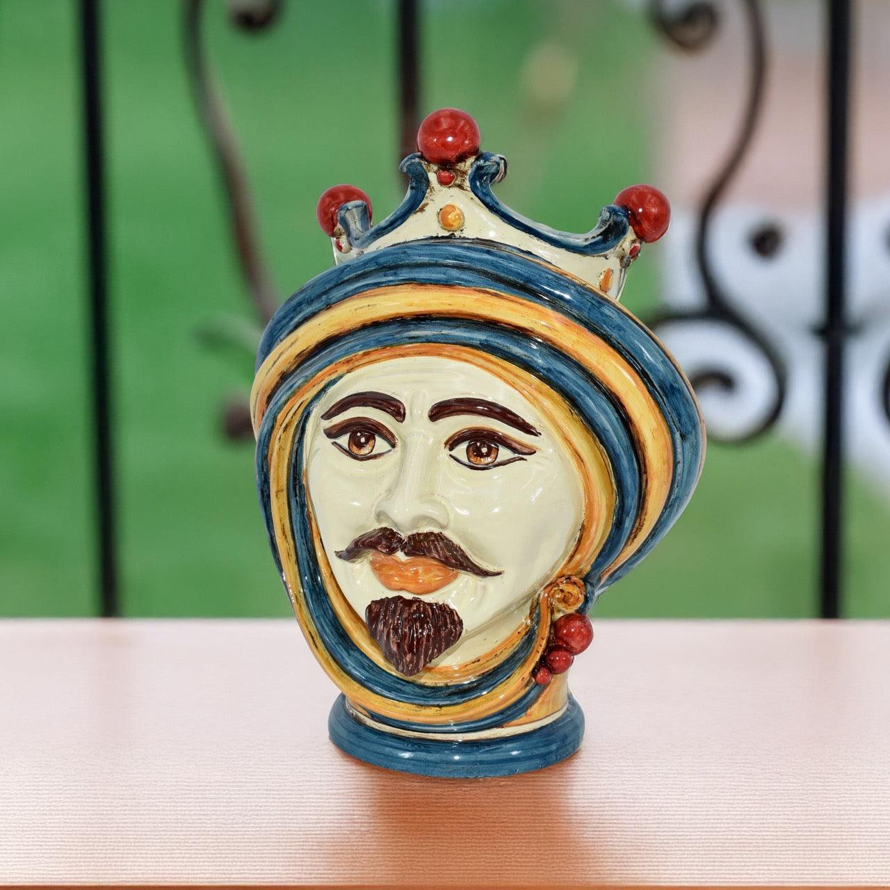 Handcrafted Teste di Moro ceramic head with crown, vibrant blue and gold turban, traditional Sicilian decor