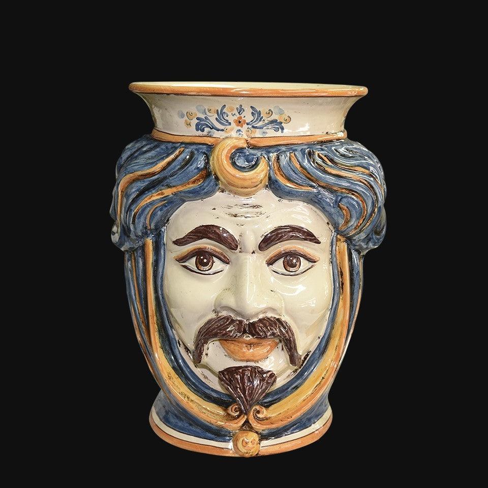 Handcrafted Teste di Moro vase with blue hair, mustache, and ornate details, blending tradition and modern design.