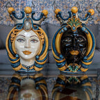 Handcrafted Teste di Moro ceramic sculptures with ornate crowns, vibrant blue and gold details, reflecting Sicilian tradition and modern design.