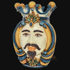 Handcrafted Teste di Moro ceramic face with crown, vibrant blue and gold details, traditional Sicilian design