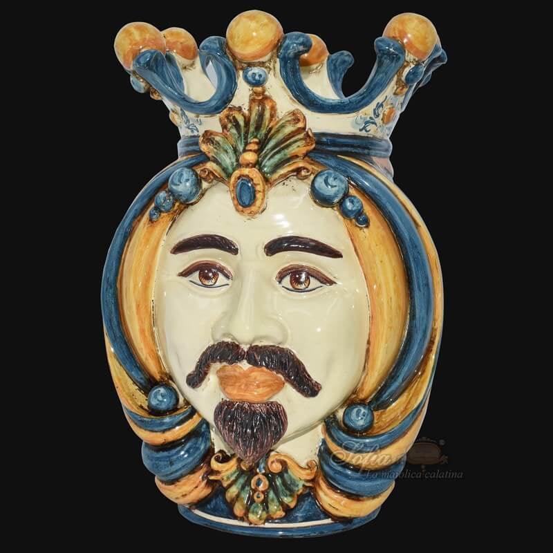 Handcrafted Teste di Moro ceramic face with crown, vibrant blue and gold details, traditional Sicilian design