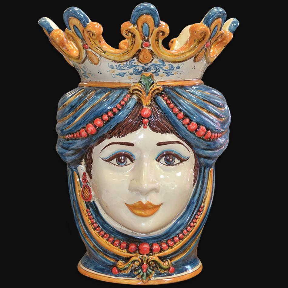 Handmade Sicilian Teste di Moro vase with blue turban, crown, and red beads, blending tradition and modern design