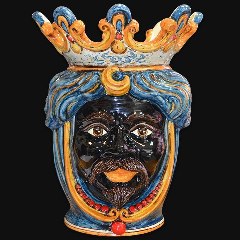 Handcrafted Teste di Moro ceramic vase with vibrant blue, gold, and red details, showcasing traditional Sicilian artistry.