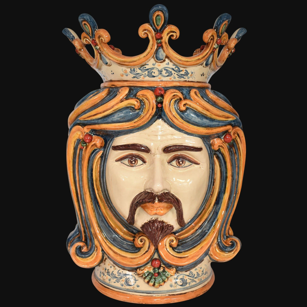Handcrafted Teste di Moro ceramic vase with crown, vibrant blue and orange swirls, traditional Sicilian design