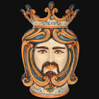 Handcrafted Teste di Moro ceramic vase with crown, vibrant blue and orange swirls, traditional Sicilian design