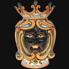 Handcrafted Teste di Moro ceramic vase with crown, vibrant blue and orange swirls, and detailed facial features