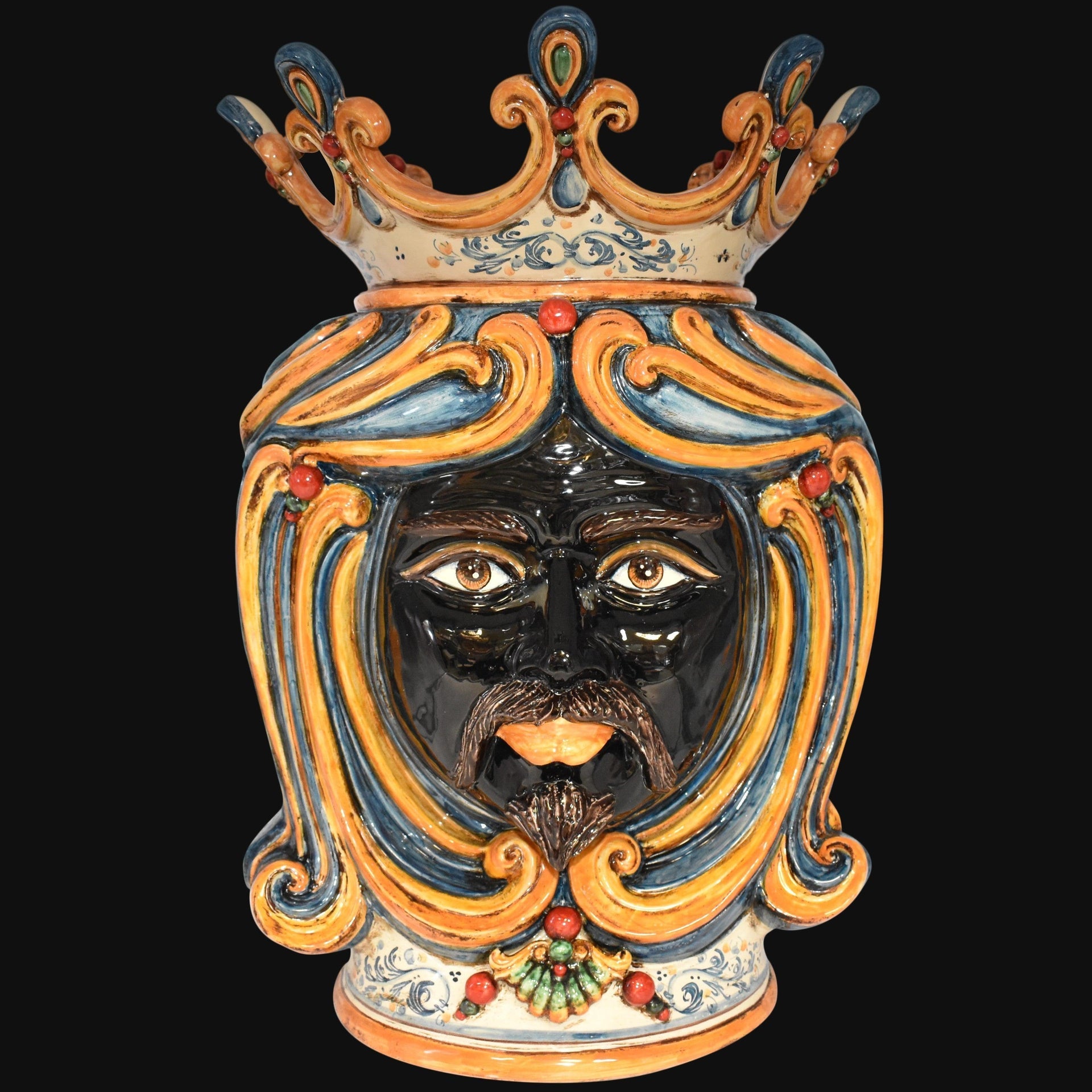 Handcrafted Teste di Moro ceramic vase with crown, vibrant blue and orange swirls, and detailed facial features