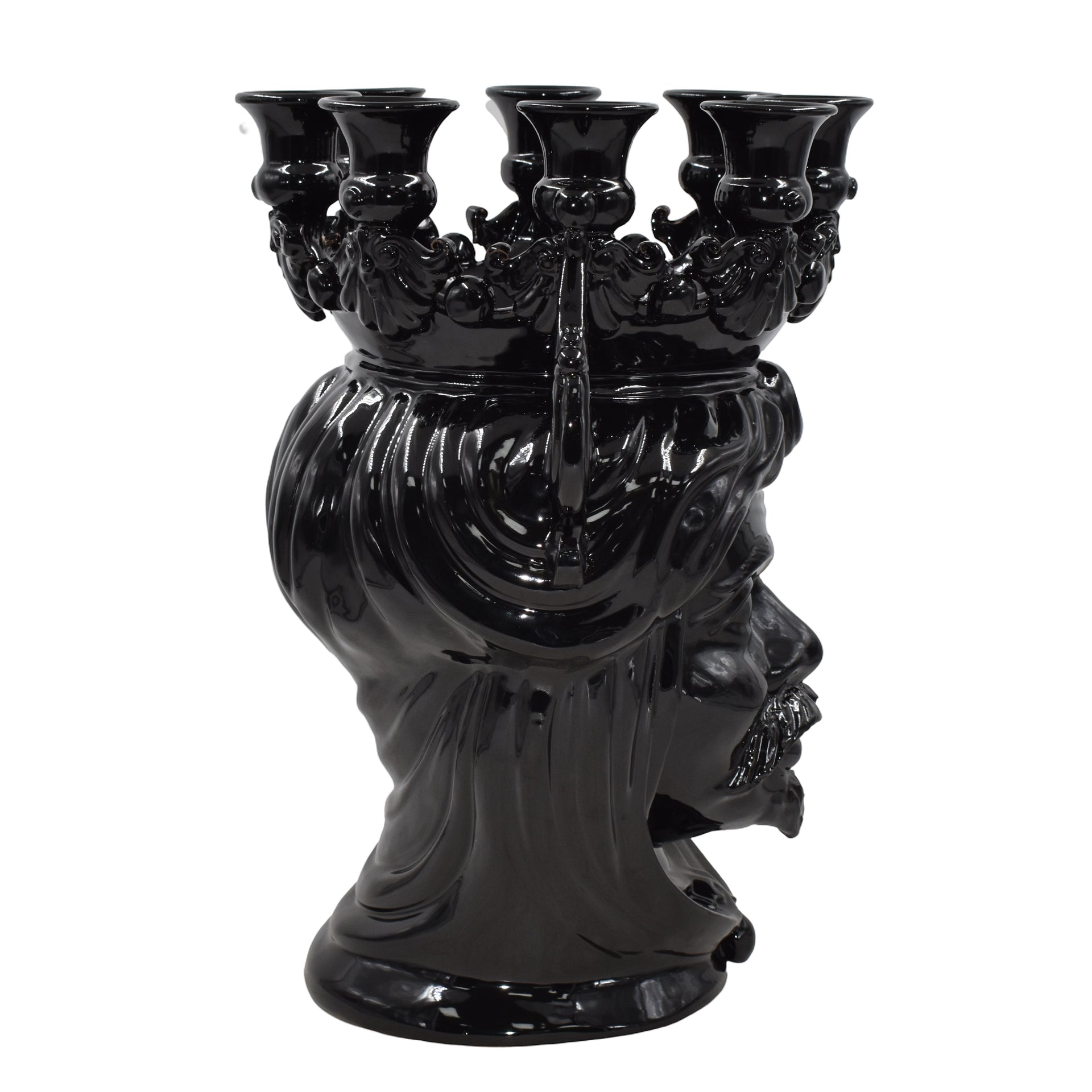 Black ceramic Teste di Moro candle holder with ornate crown and multiple arms, handmade decorative piece