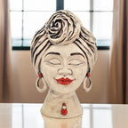 Handmade Teste di Moro ceramic bust with red lips, earrings, and rose turban, blending tradition and modern design.