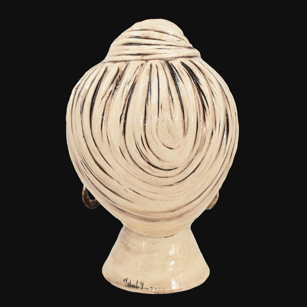 Handcrafted Teste di Moro ceramic head with swirling black and cream glaze, traditional Sicilian design