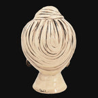Handcrafted Teste di Moro ceramic head with swirling black and cream glaze, traditional Sicilian design