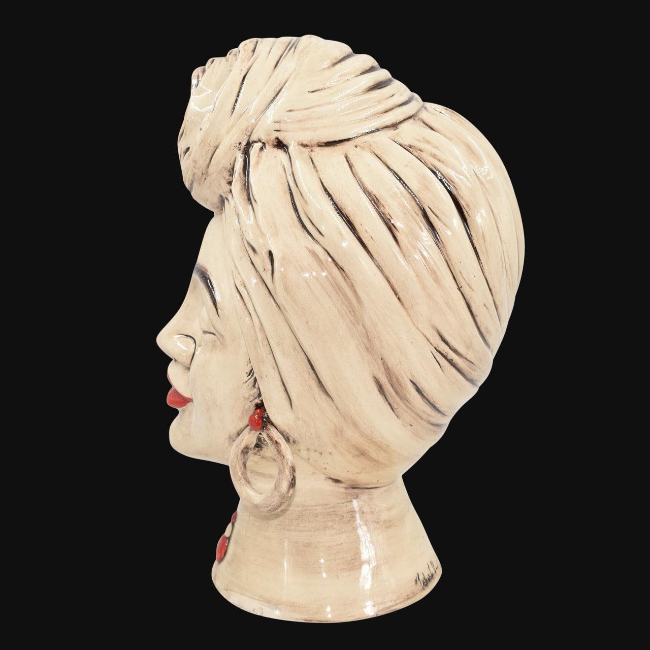 Handmade ceramic Testa di Moro with turban, red lips, and earrings, blending tradition and modern design.